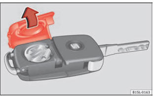 Chiave del veicolo: copertura del vano della batteria.